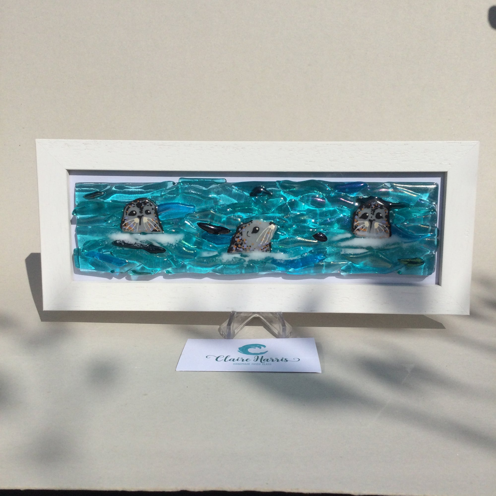 Limited Edition Framed Seals, rectangle framed fused glass