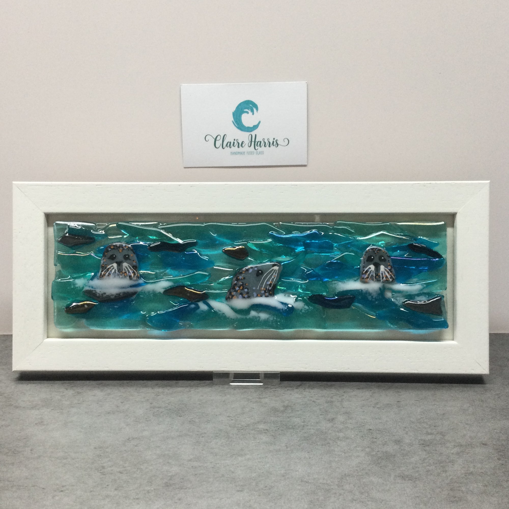 Limited Edition Framed Seals, rectangle framed fused glass