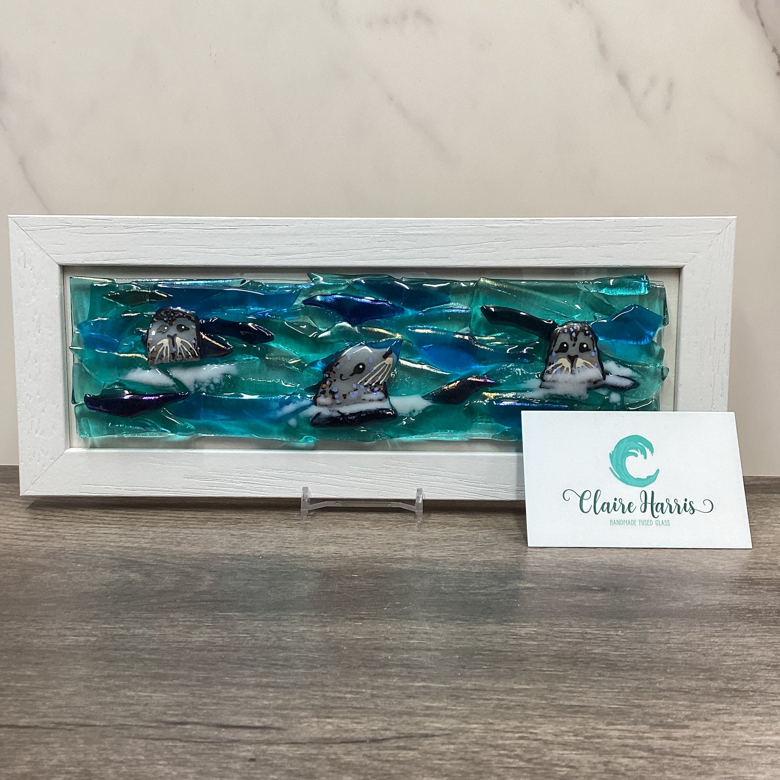 Regular sized framed Seals, rectangle framed fused glass