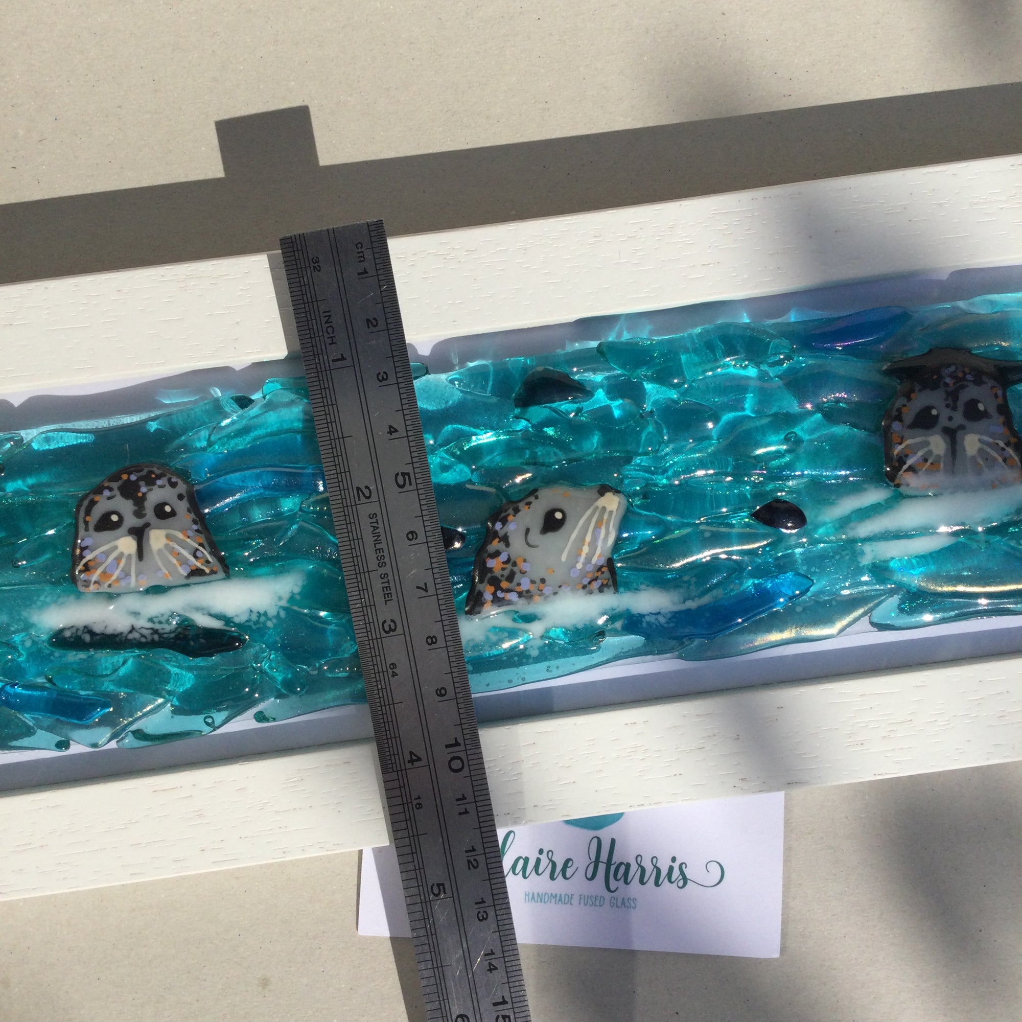 Limited Edition Framed Seals, rectangle framed fused glass