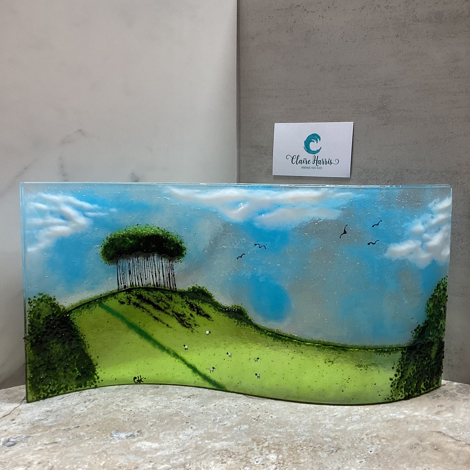 Fused Glass Jumbo Nearly Home Trees, main product front view with a business card.