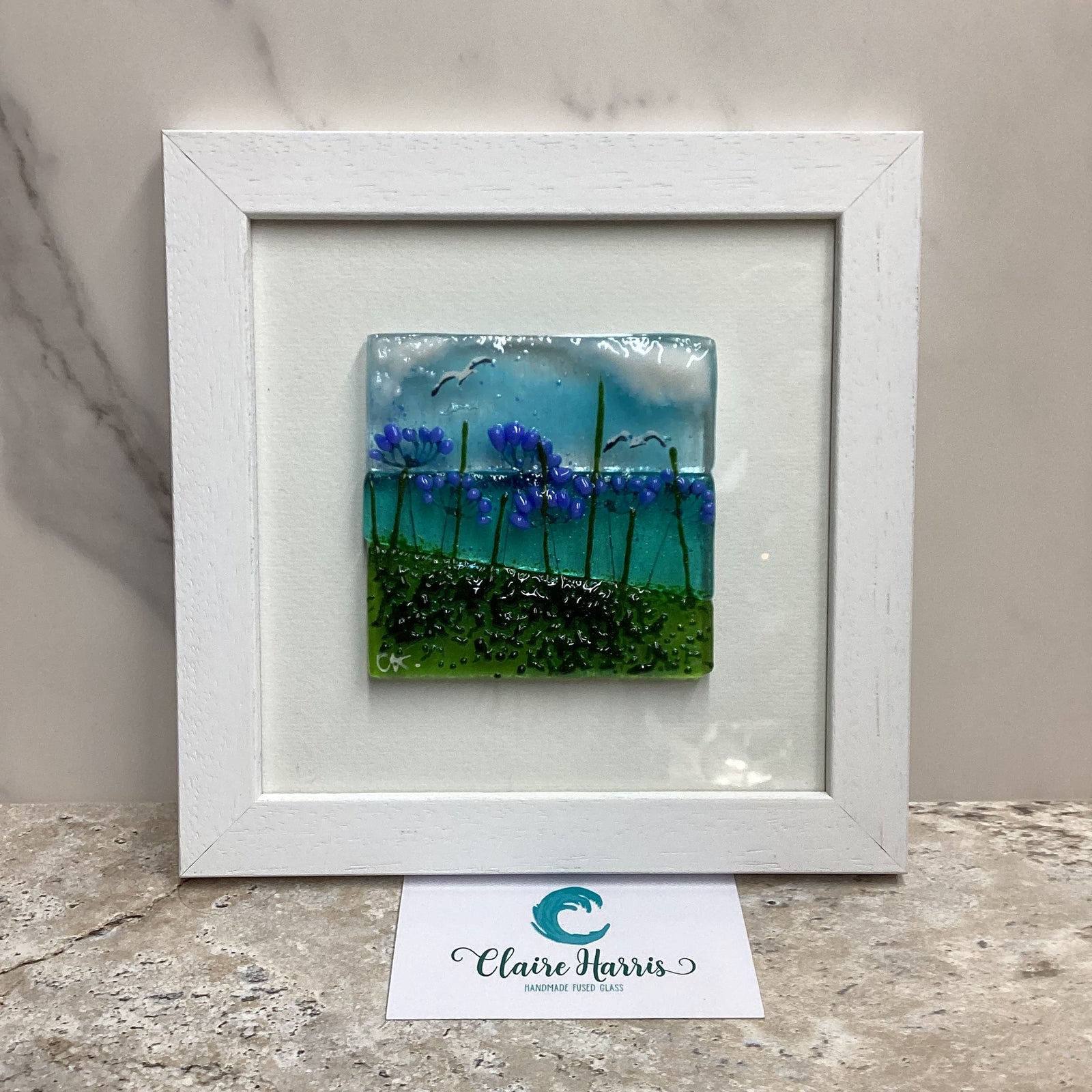 Fused Glass Square Framed Agapanthus, main product image with a business card.