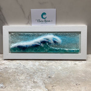 Fused Glass regular size framed Light Aqua crashing wave design, front view with a business card.