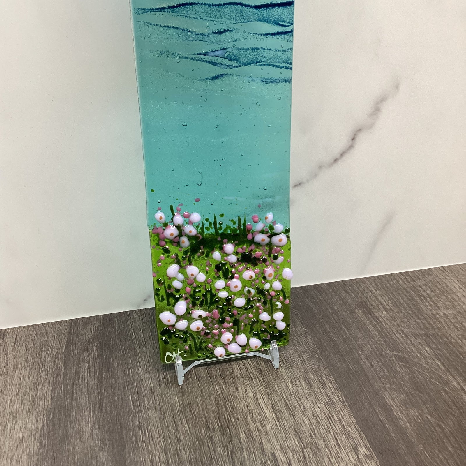 Fused glass large hanger with sea pinks or sea thrift.