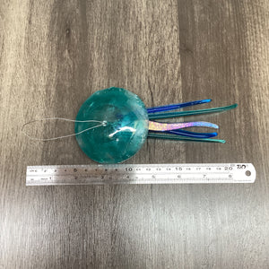 fused glass light aqua jellyfish, accompanied by a ruler for scale.